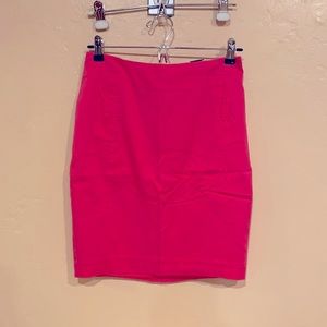 Pink H&M pencil skirt with cute bow fake pockets.